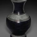 A burnished black pottery jar and cover, hu, Warring States Period-Early Western Han Dynasty, 3rd-2nd century BC