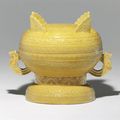 A yellow-glazed molded archaistic ritual food vessel and cover, gui. 19th century 