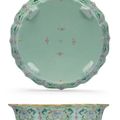 An unusual famille rose celadon-ground shallow footed dish, Qianlong period (1736-1795)