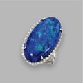 25.69 carats oval cabochon opal and diamond ring