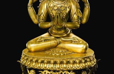A Sino-Tibetan gilt-bronze figure of Avalokitesvara, Qianlong mark and period (1736-1795)