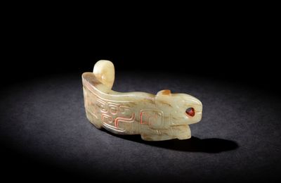 A jade tiger pendant, Zhou Dynasty
