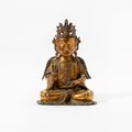 A Chinese gilt-bronze figure of Guanyin, Ming dynasty, 17th century