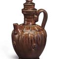 A rare chestnut-glazed pottery ewer, China, Liao Dynasty (AD 907-1125)