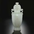 A well-carved white jade vase and cover, Qing dynasty, 18th-19th century