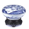 A circular blue and white 'boys' box and cover, Qing dynasty, 18th-19th century