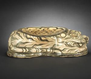 A Cizhou ware ceramic 'tiger' pillow. Jin dynasty