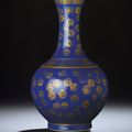 A blue-glazed gilt-decorated bottle vase, Guangxu gilt six-character seal mark and of the period (1875-1908)