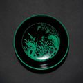 A green decorated, black-ground saucer dish. Yongzheng & A pair of famille rose dishes. Guangxu 