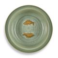 A large biscuit-decorated Longquan celadon 'Twin fish' basin, Yuan – early Ming dynasty