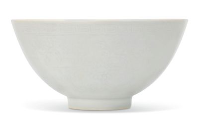A large white-glazed anhua-decorated deep bowl, lianziwan, Yongle period (1403-1424)