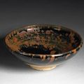 A Cizhou type black glazed stoneware bowl with russet splashes. Northern Song-Jin Dynasty