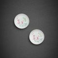 A fine pair of 'boneless' famille-rose saucer dishes, Marks and period of Yongzheng