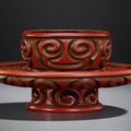 A carved tixi cinnabar lacquer cupstand, Late Yuan-Early Ming dynasty, 14th century