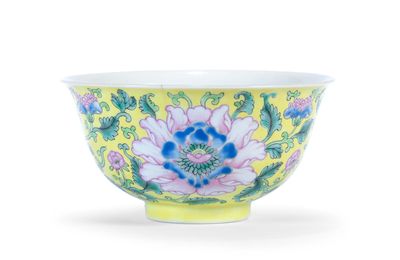 A yellow-ground famille rose 'floral' bowl, Daoguang seal mark and of the period (1821-1850)
