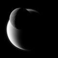 Rhéa éclipse Titan.