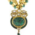 An emerald, diamond, enamel and seed pearl three-strand pendant-necklace