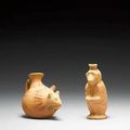 An Etrusco-Corinthian terracotta 'plastic vase'/monkey and a Sicilian terracotta 'plastic vase'/mouse. Circa 5th Century B.C.