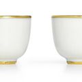 A fine pair of small white-glazed cups, Marks and period of Kangxi