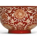 A coral-ground reserve-decorated 'Lotus' bowl, Qianlong seal mark and period (1736-1795)