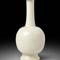 An Exceptional And Extremely Rare Dingyao Carved 'Peony' Bottle Vase, Northern Song Dynasty (960-1127)