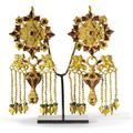 A pair of Bactrian gold, garnet and glass earrings, circa 1st century AD.