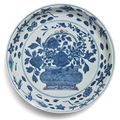 A blue and white polychrome-enameled 'flower basket' dish, Wanli mark and period (1573-1619)