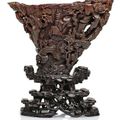 A rare and large very fine carved rhinoceros wine cup. China, 17th-18th ct