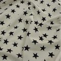 Tissu coton blanc à étoiles bleues marine