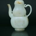 A fine and rare white jade 'double-gourd' ewer with poem inscription. China, Qing dynasty (1644-1911)