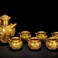 A set of six gold cups and a ewer, late Tang dynasty or Five Dynasties, 7th-10th century