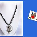 539. pendentif hibou sur chaine torsadée 30€