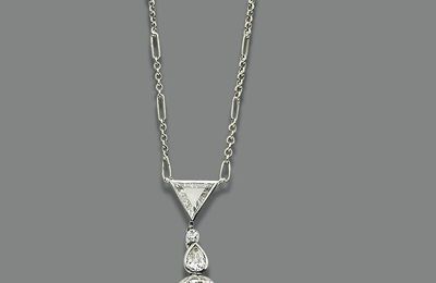 A natural pearl and diamond pendant necklace
