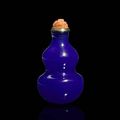 A blue glass 'double gourd' snuff bottle. Mid Qing dynasty