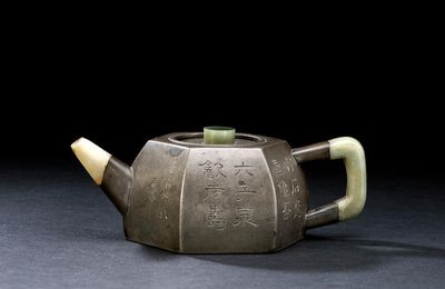 An inscribed Yixing stoneware hexagonal pewter-cased teapot and cover, Daoguang period, signed Yang Pengnian