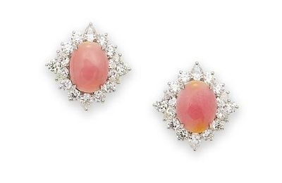 A fine pair of conch pearl and diamond earring