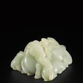 A pale celadon jade 'Three rams' carving, Qing dynasty, 18th century