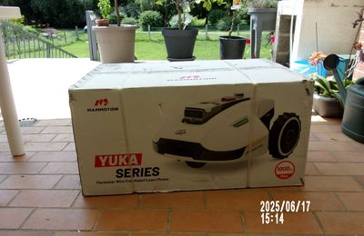 Arrivée du robot de tonte avec balayeuse,
