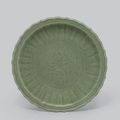 A Longquan celadon 'Lotus' barbed rim charger, Ming dynasty, 15th century