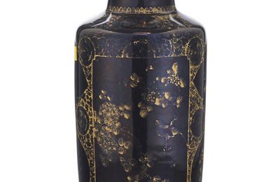 A gilt-decorated 'mirror black' rouleau vase, Kangxi period (1662-1722)