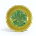 A yellow-ground green-enamelled ‘Longevity’ dish, Jiajing mark and period (1522-1566)