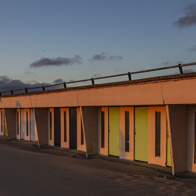 Le Touquet - cabanes de plage éclairées par le Coucher de soleil