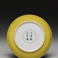 A yellow-glazed incised saucer dish, Yongzheng mark and period