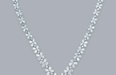 An impressive coloured diamond and diamond pendant necklace