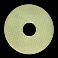 A rare pale grey jade disc, bi, Han dynasty, 2nd-1st century BC