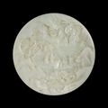 A finely carved white jade 'figural' circular table screen, Qing dynasty, Qianlong period