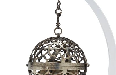 A small silver spherical incense burner, Tang dynasty
