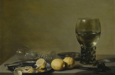 Pieter Claesz., Still life of lemons and olives, pewter plates, a roemer and a façon-de-Venise wine glass on a ledge