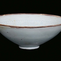 A blue earthenware bowl with vegetables and children decorations, China, Song Dynasty (960-1279)