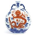 A magnificent and extremely rare iron-red and underglaze-blue 'Dragon' moonflask, Seal mark and period of Qianlong